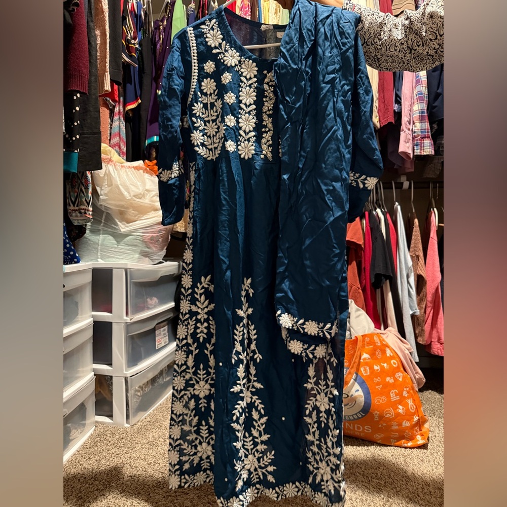 Woman’s desi clothing.New never worn. Size XXL. With pants. All embroidered work